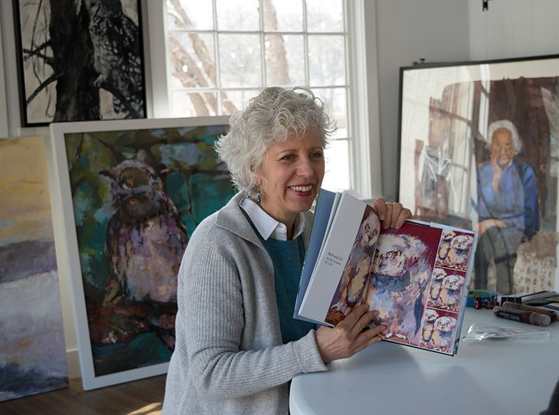 Kent shows owl painting from her book. ‘Herb and Glo’ a 36” x 36” acrylic holds special meaning for the artist