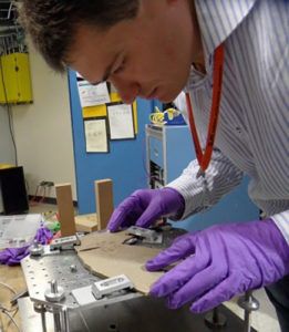 Dr. Fabien Knoll in lab analyzing bone development of the baby bird fossil. Photo credit: The University of Manchester