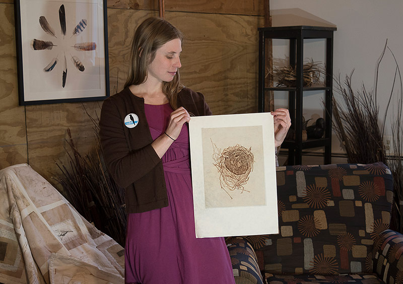Katie honors the bird and its nest with her artwork